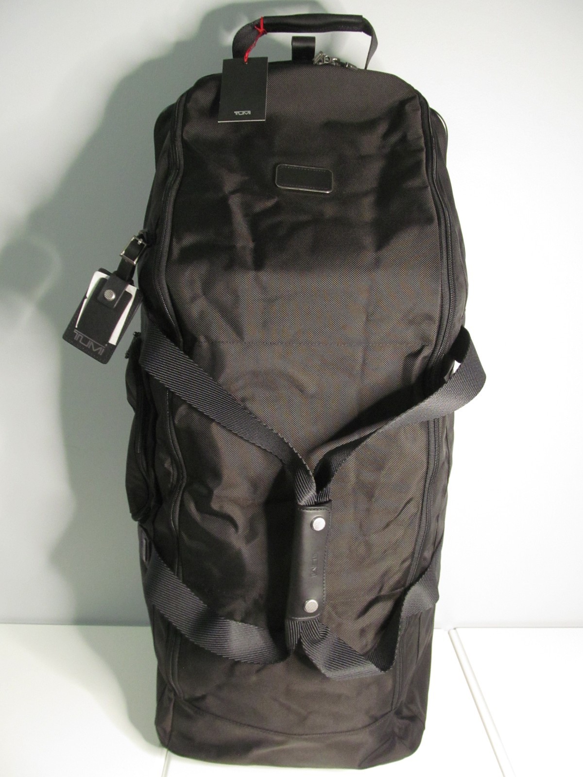 TUMI Pinehurst Extended Trip Collapsible Black Duffel Rollin