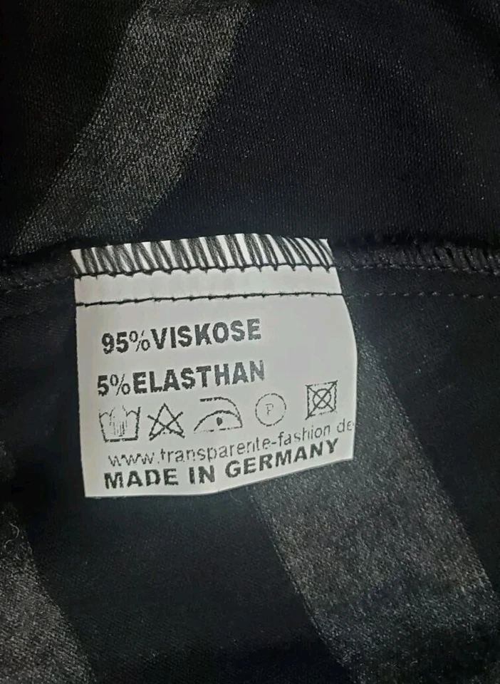 Top túnica cuello capucha a rayas etiqueta negra transparente dobladillo borla asimétrica Foto 4 de 4