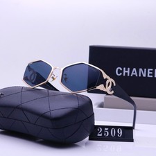 Unisex fashion glasses, black with gold accents.