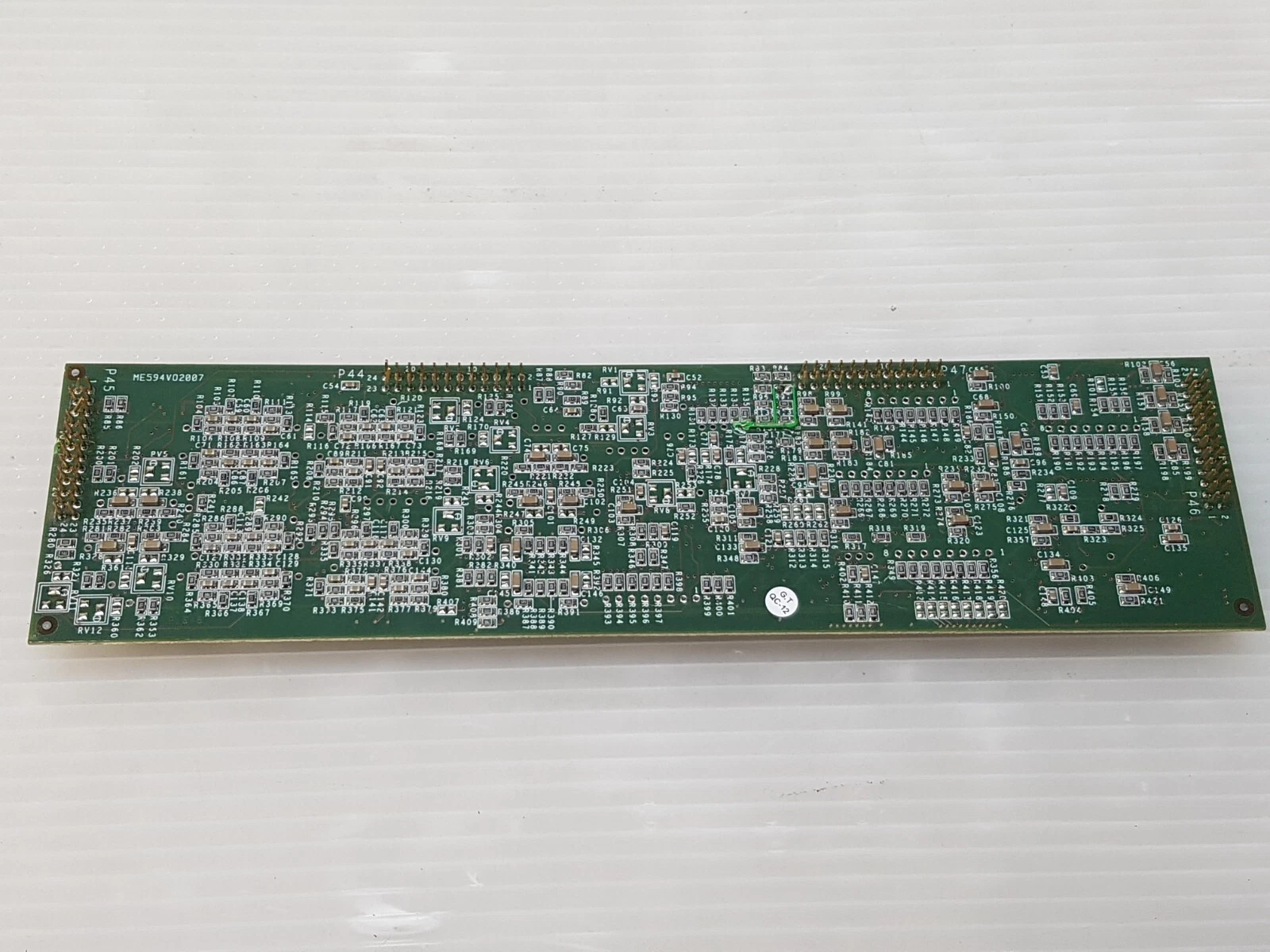 Solder side of the Lumenis EA6614001-0 board with header pin rows