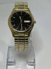 Seiko Mens Vintage 1990 7N43-9048 Black Dial Goldtone Quartz Day/Date Watch 37mm
