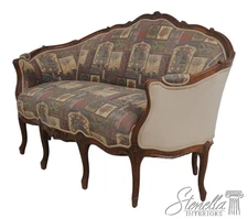 L71189: French 9 Leg Walnut Settee Loveseat