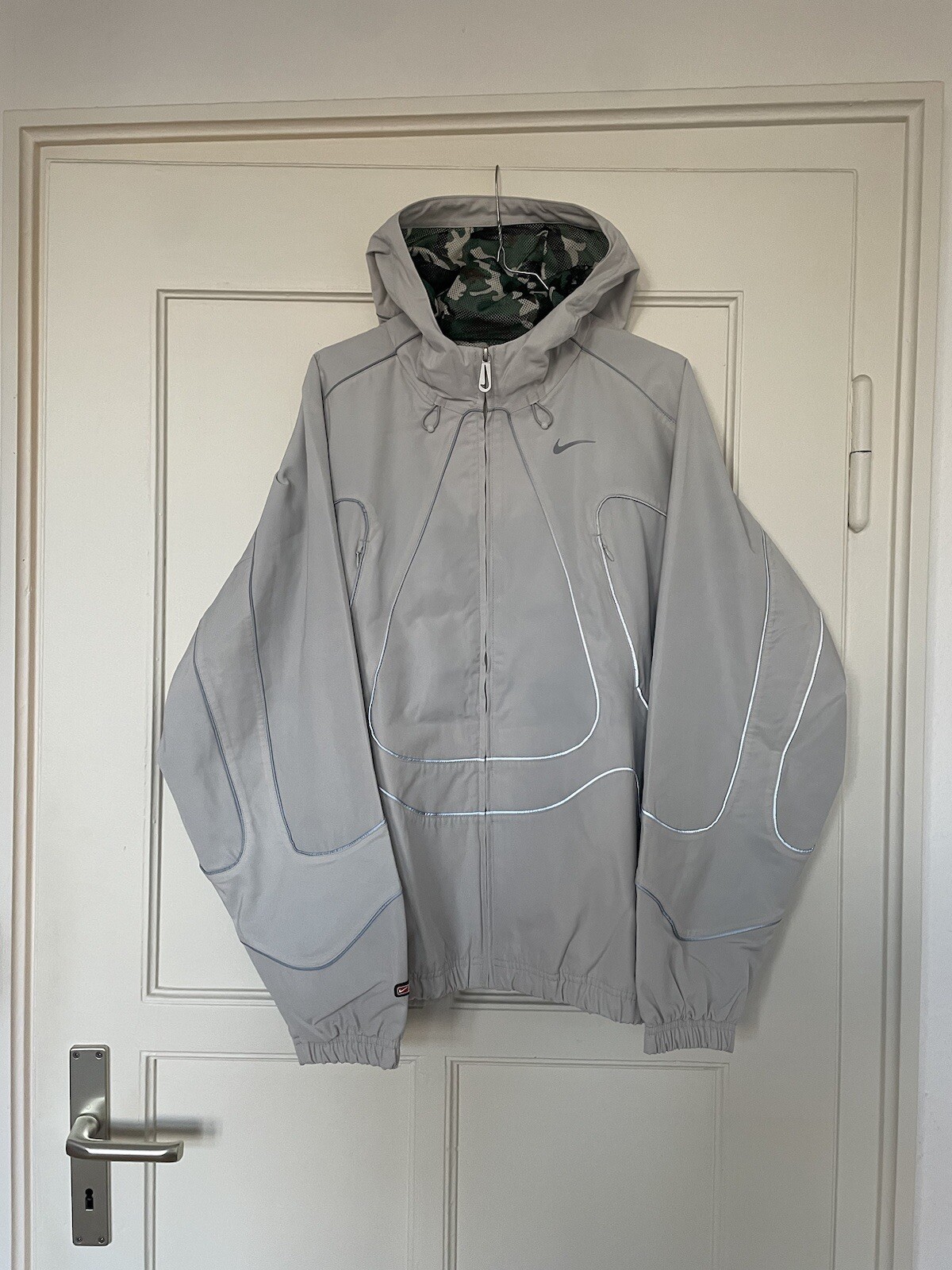 OFF WHITE X NIKE Giacca Nike x Corteiz NRG bianco sporco grigio riflettente