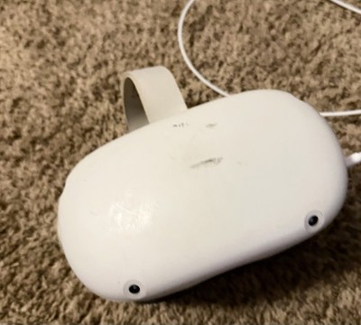 Meta Quest 2 VR, 2 controllers, charger cord, portable charger, white.
