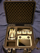DJI Mini 3 Ready to Fly Camera Drone Kit, 3 Batteries, Hard Case, Never Flown