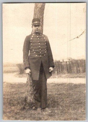 Vtg B&W Snapshot Teenage Boy In Ornate Button Uniform Leaning On Tree 1920s