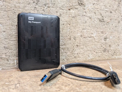 WD Western Digital 1TB My Passport External Hard Drive USB 3 (WDBBEP0010BBK-03)