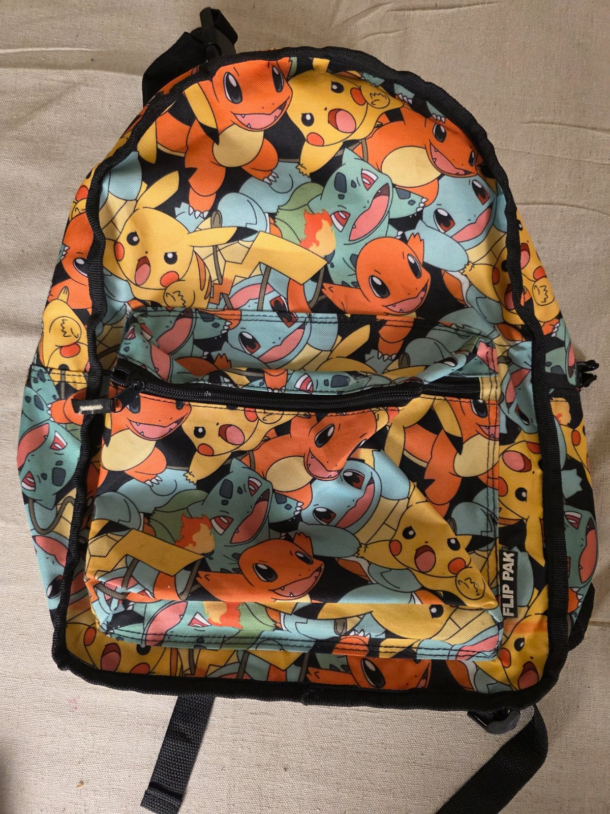Pokemon Flip Pak Backpack Pikachu Charmander Bulbasaur Squirtle 16in