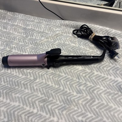 Remington 1 1/4 Clipped Curling Iron- C11A132 Nice curls and heats up fast!