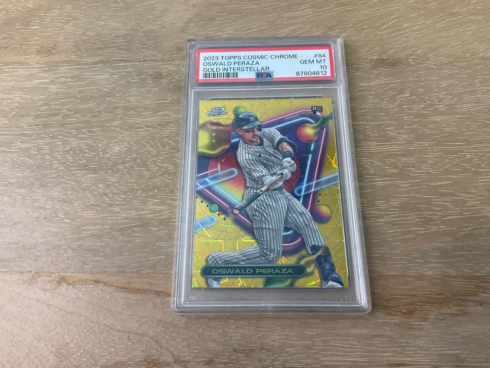 2023 Topps Cosmic Chrome Oswald Peraza Gold Interstellar Rookie /50 SP PSA 10
