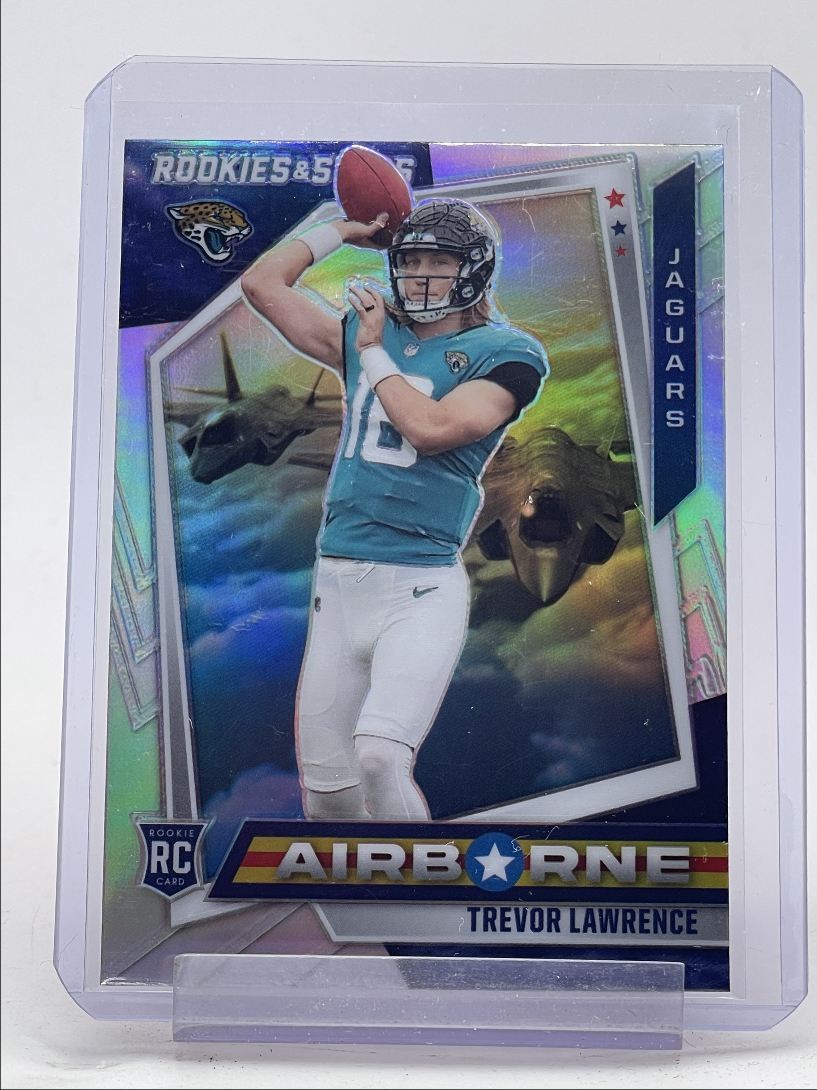 TREVOR LAWRENCE 2021 ROOKIES & STARS AIRBORNE ROOKIE SILVER PRIZM RC Q5159