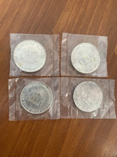 Lot of (4) 1986 Sunshine Mining 1 Troy ounce .999 fine Silver Eagle round
