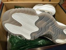Air Jordan 11 Retro IE Low Light Orewood Brow...