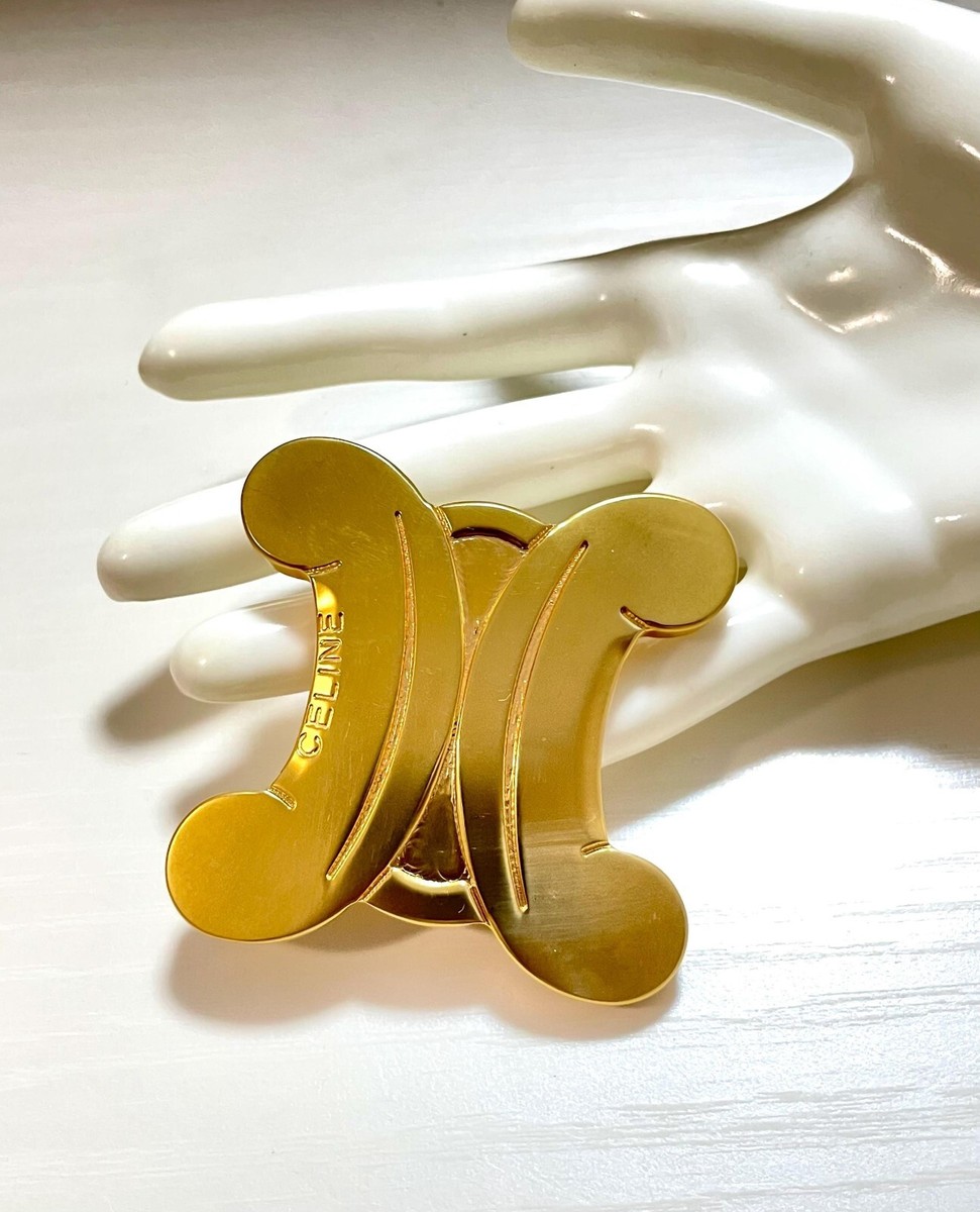 Vintage Celine extra big golden triomphe brooch. Great