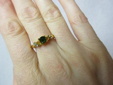 Gold Costume Ring with Brilliant Cut Green Stone, & Tiny Clear Stones, Size O