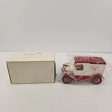 Vintage ERTL coin bank, 1913 Model T Van, Carnation brand logo, new, with box