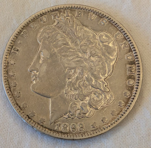 1892 MORGAN DOLLAR AU