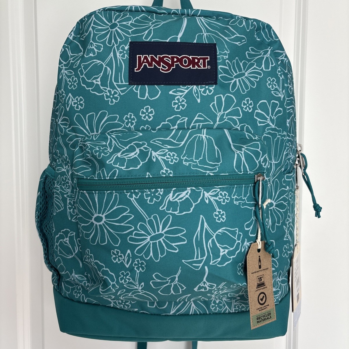 JANSPORT 公式 ダブルトーン DELIGHTFUL DAISIES GREEN JanSport Delightful Daisies Green Floral Cross Town Plus