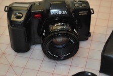 Minolta Maxxum 8000i, 35mm Camera, 50mm lens, flash. Film tested, nice