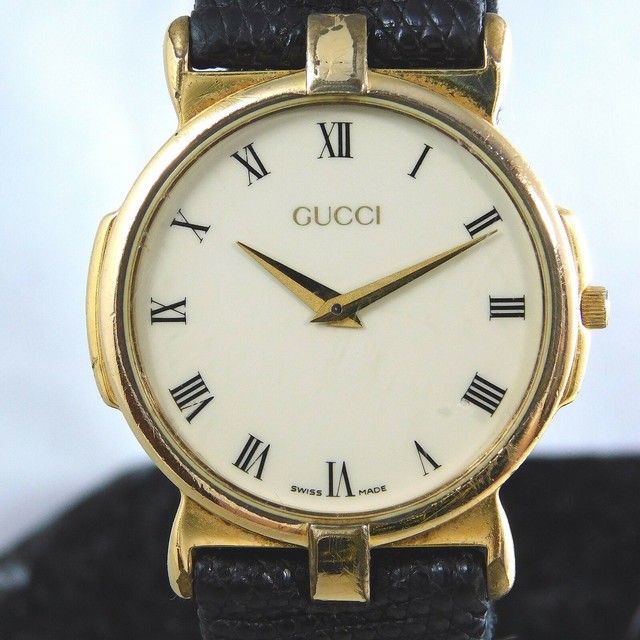 Gucci Gold Tone Roman Numeral Dial 31mm 