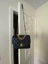 CHANEL Black Quilted Chain Strap Gold Hardware Shoulder Bag with Logo Accent