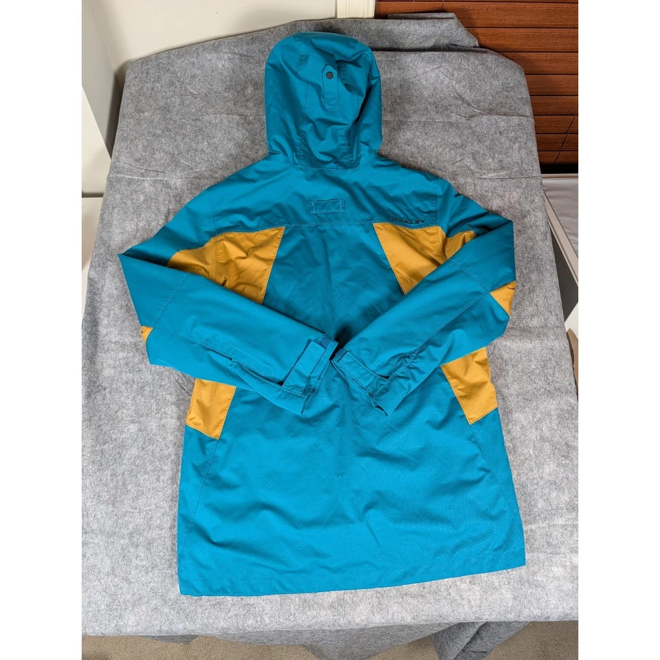 Jaqueta de esqui Oakley snowboard azul-petróleo bloco dourado zíper completo com capuz masculina G - Imagem 3 de 4