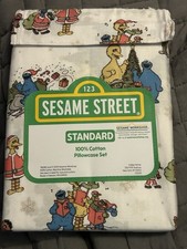 NWT 2 PIECE SESAME STREET CHRISTMAS STANDARD 100 COTTON PILLOWCASE SET