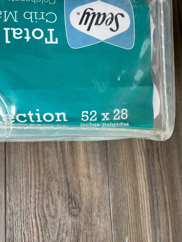 Almohadilla de colchón para cuna Sealy Total contra manchas blanca impermeable 52" x 28" Foto 4 de 4