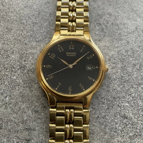 Vintage Men’s Seiko Watch 33mm Gold Tone Case Black Dial With Date V722 7058 BU