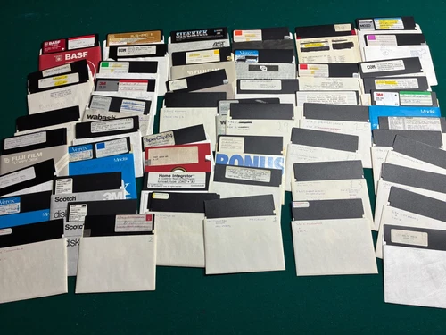 HUGE Lot Commodore 64 128 Games utilities Floppy disks