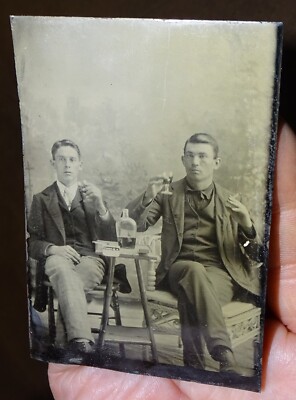 Tintype Photograph of 2 gents with whiskey and cigarettes, circa 1860s or  1870s