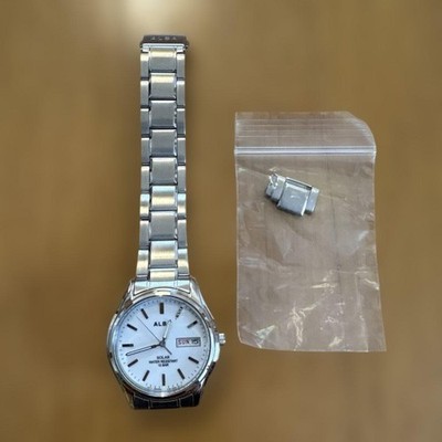 ALBA Quarzuhr Silber Metallband Datumsanzeige 18,5 mm Armbandgröße