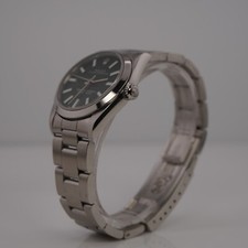 Rolex Oyster Perpetual 31mm Stainless Steel Green Dial Watch Ref 77080 10