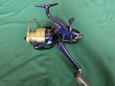 Shimano Thunnus 6000 F spinning reel with super stopper & bait runner, excellent