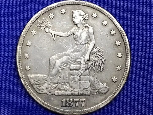 1877 Trade Dollar – Raw – Awesome Strike – Original Surfaces – Rim Bumps Noted