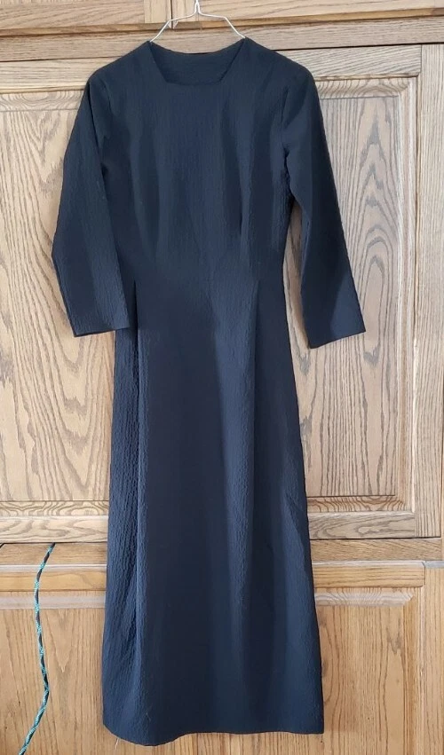 Mennonite in top a black dress