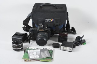C63D16 Canon T80 analoge Spiegelreflexkamera mit Zubehör ua Objektiv 35 70 mm