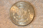 1878-S. AU/BU GOOD OVER EAR LINES UNC MORGAN DOLLAR