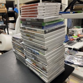 A lot of 40 sealed vintage video games Wholesale Resale Lot Dreamcast PS2 WII