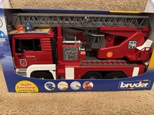 Bruder 02771 MAN Fire Engine w/ Water Pump and Light & Sound Module new in box. 