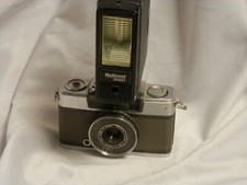 Vintage Cameras: Olympus-Pen EE-2 Japan 1/2 frame with National 2401 flash unit