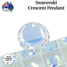Swarovski 6210 Crescent Moon Pendant   AB - 17mm. 4 pieces per packet.