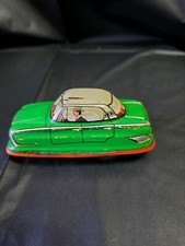 Vintage Tin Friction Family Care