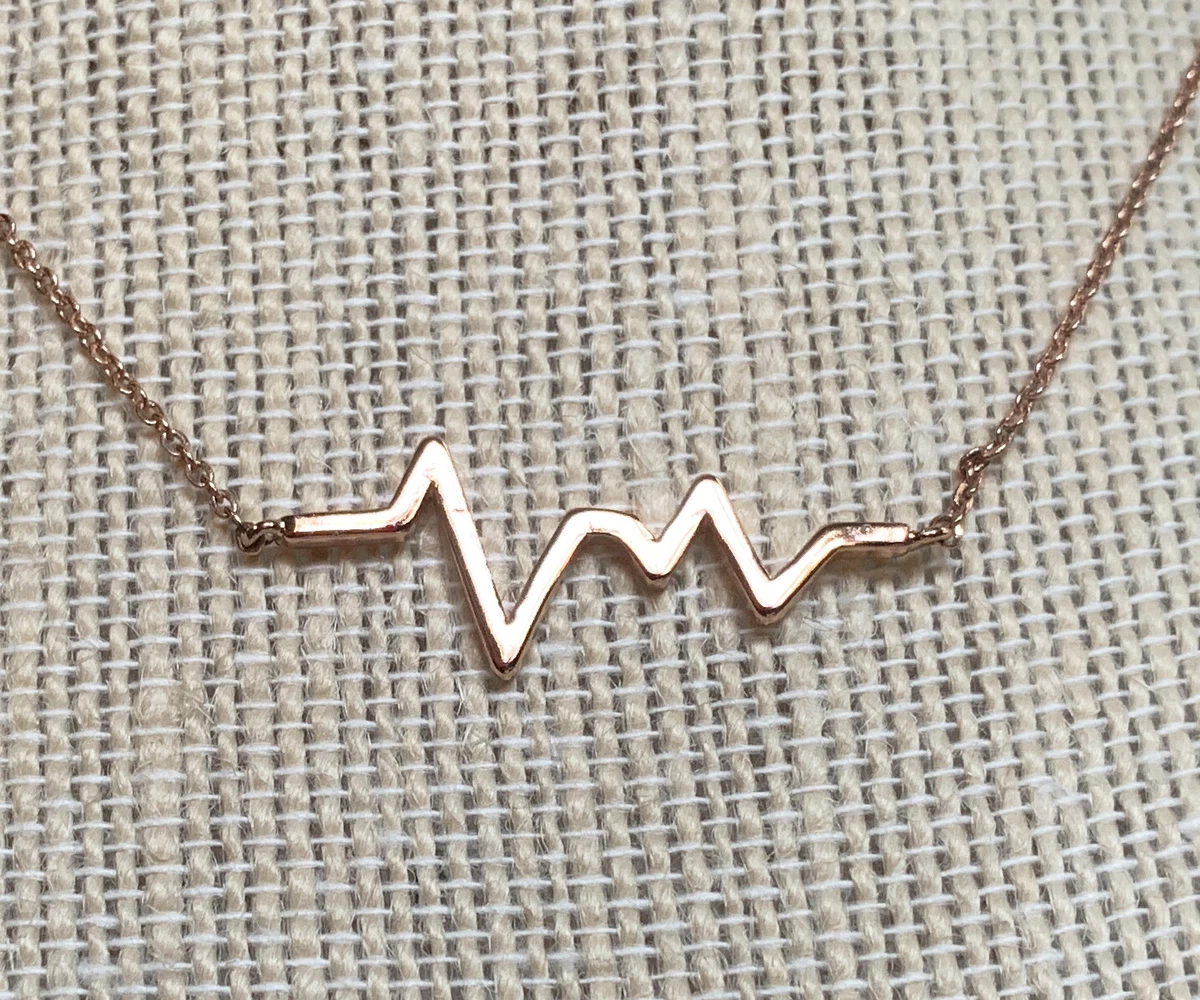 Heart monitor necklace sale