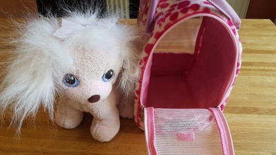 toy dog in carry case