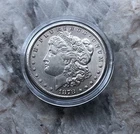 1878-CC Morgan Silver Dollar In Almost Condition.