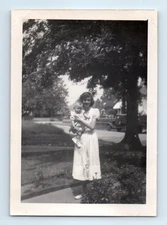 Old Vintage Photo WOMAN HOLDING BABY IN FRONT YARD FOUND PHOTOGRAPH
