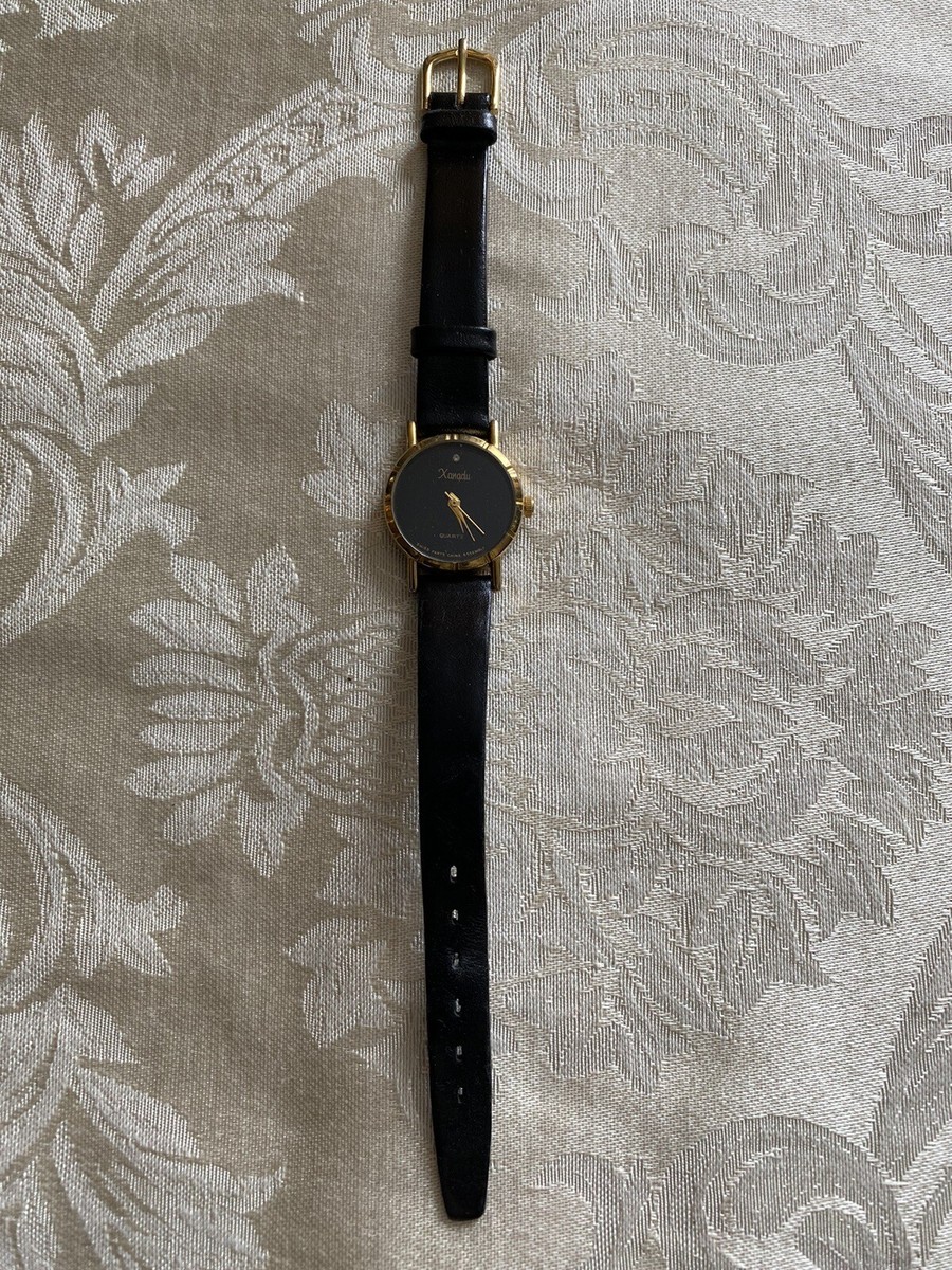 Vintage Xanadu Women's Quartz Watch Gold Face Black Leather Band