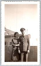 Vtg B W Snapshot WWII Soldier in Uniform  Smiling Woman On Rooftop 1940s