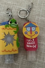 Disney Parks It's A Small World Sanitizer Holder Keychain 1st Edition & Pascal!